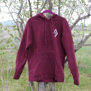 Burgundy hoodie made in a small Wyoming town.